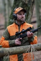 Blaser Tackle Softshell Jacke Herren oliv/orange in action vorne